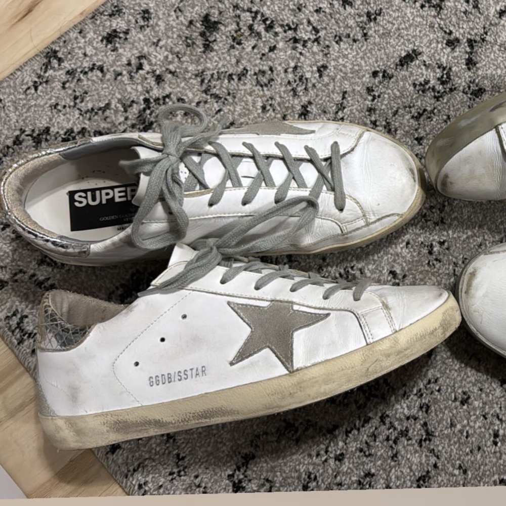Gently worn white and silver golden goose sneakers